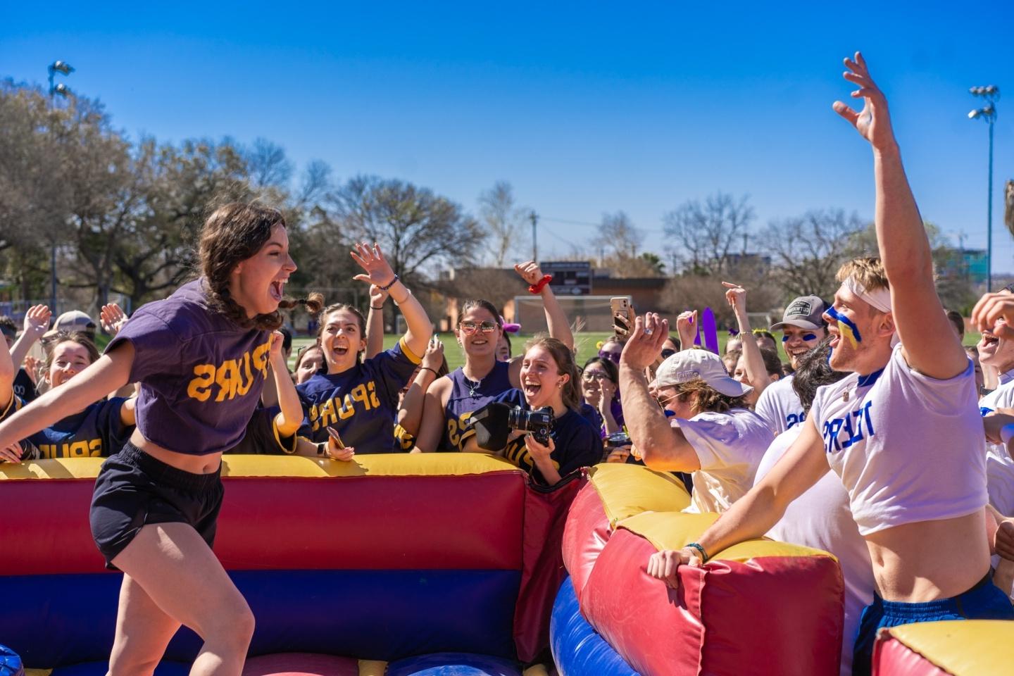 Photo of students celebrating at a Greek Olympics event